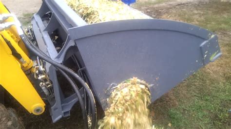 skid steer feed auger bucket|auger attachments for skid steers.